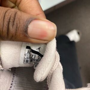 8c purple and white Jordan 12s